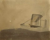 Side view of the Wright 1902 glider in flight at Outer Banks, North Carolina
