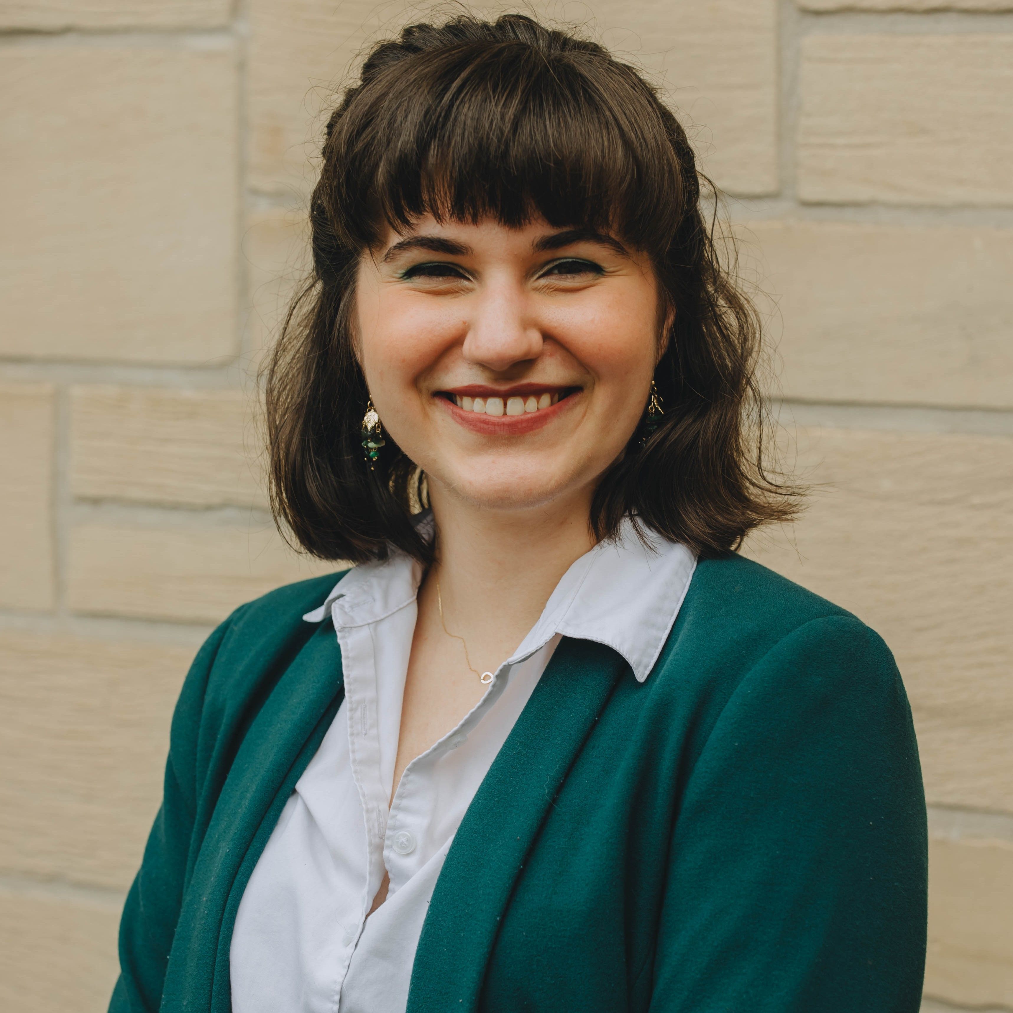 Rachel Elise Wiedman - Headshot 2023 sq.jpg