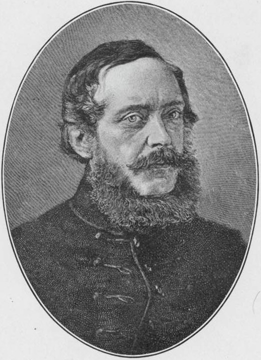 Black and white engraving of a white man in an oval frame. He faces slightly to his left and has dark hair parted on the side, a mustache, and a beard. He wears a dark jacket buttoned up to his collar.