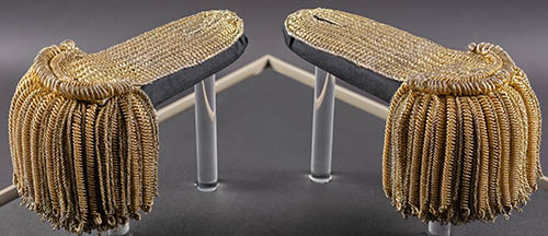 Epaulets worn by George Washington Woven gilt lame, yellow silk, white silk Epaulets worn by George Washington Woven gilt lame, yellow silk, white silk