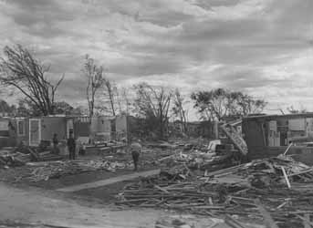 Damage to neighborhood from Worcester tornado Photograph