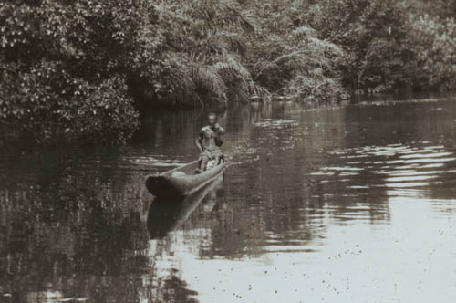 Native in dug-out Lantern slide