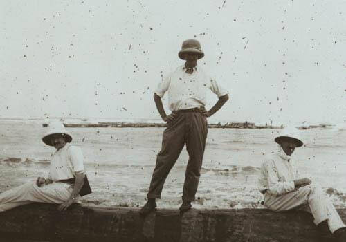 Log drifts ashore from raft lost on bar Lantern slide
