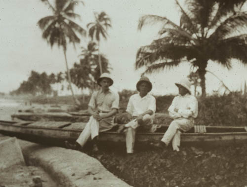 Resting on dug-out canoe Lantern slide