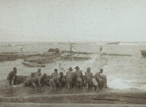 Into the water for the boat boys Lantern slide