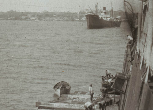 Alongside the steamer Lantern slide