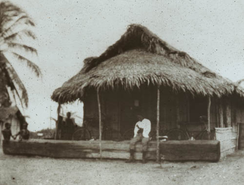 Resting in front of church Lantern slide